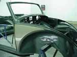 Spray the 2-tone green paint coats on the 1954 VW convertible