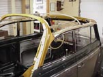 Beautifully finished new wood convertible top frame on a 1954 Volkswagen convertible bug