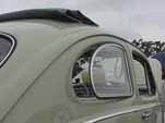 Restored Volkswagen bug has factory sunroof and side pop-out windows