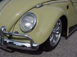 Photo shows close-up view of a restored VW bug sedan