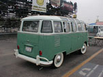 Wide white wall tires on a restored Volkswagen 23-Window samba deluxe bus