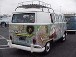 Vintage Volkswagen bus with hippie Woodstock paint job