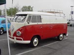 Vintage Volkswagen panel truck painted 2-tone red and white