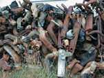 Large of Stack of Volkswagen Orignal Heater Boxes in Forgotten VW junkyard